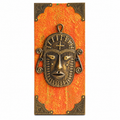 Handcrafted Tribal Face brass artefact mounted on wood for wall décor – hoWme