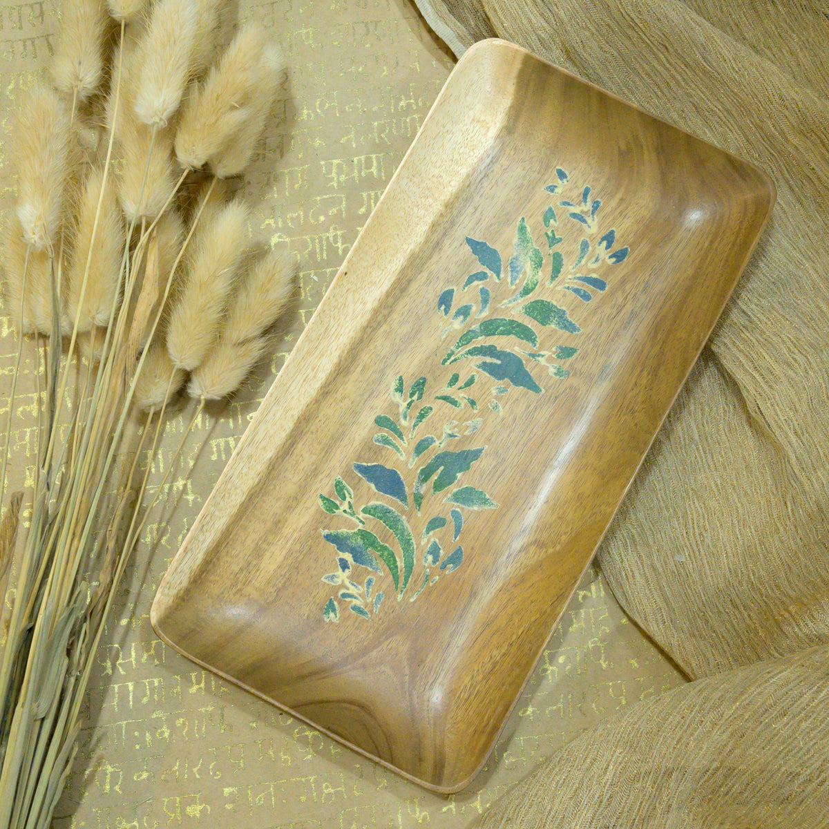 Blue and green botanical wooden serving tray styled on fabric - hoWme