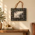 Blue and grey textured wooden photo frame hanging on a warm wall hoWme