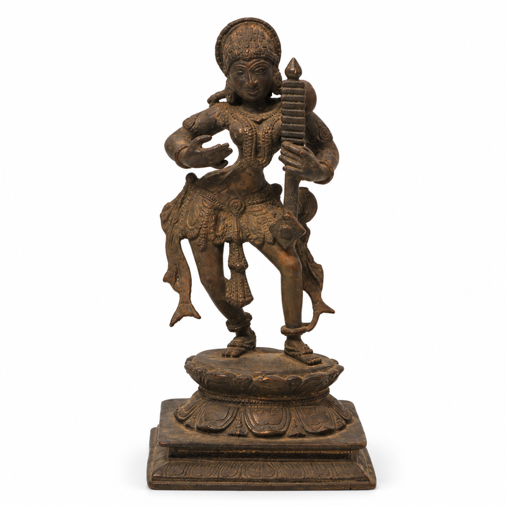 Brass dancing artefact, close view on a white background. hoWme