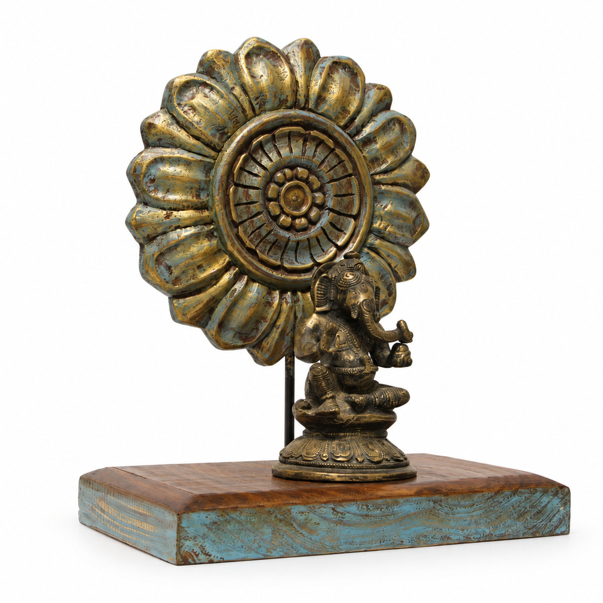 Side view of brass Ganesha on a carved blue and brown wooden base. hoWme
