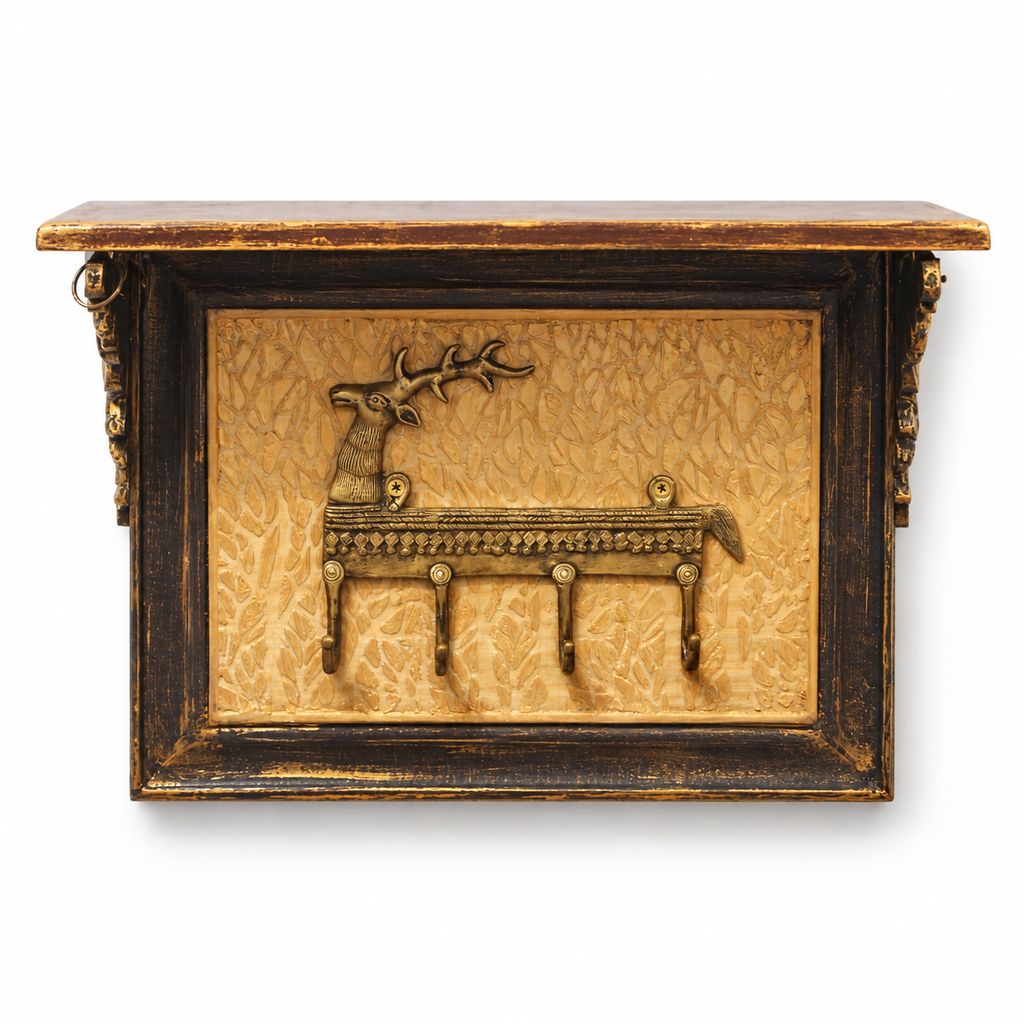 Front view of wooden deer motif wall shelf with four key hooks. hoWme