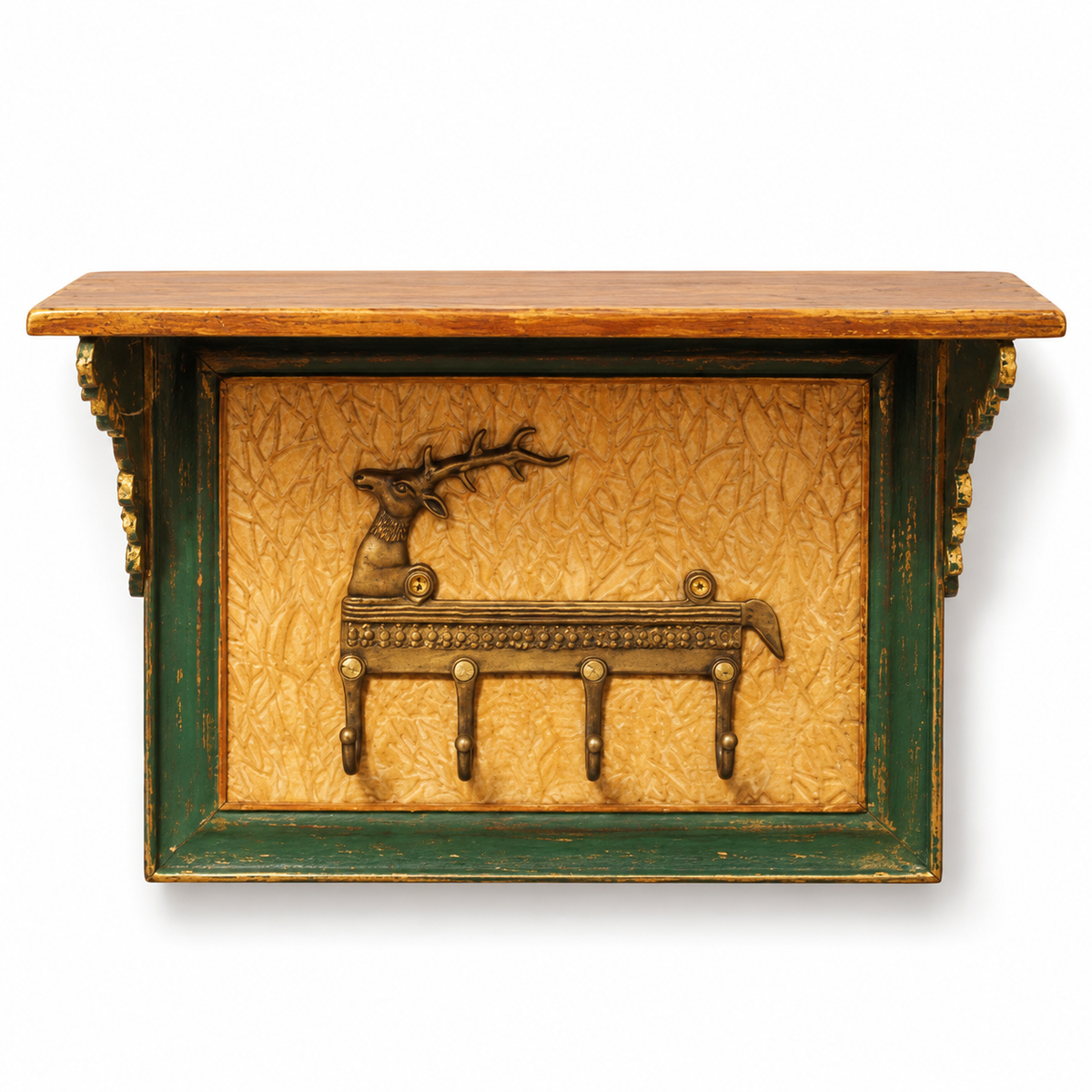 Green and gold wooden wall shelf with brass deer motif and key hooks on a white background, hoWme.