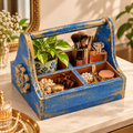 Distressed blue wooden organiser caddy styled with plant and table essentials - hoWme