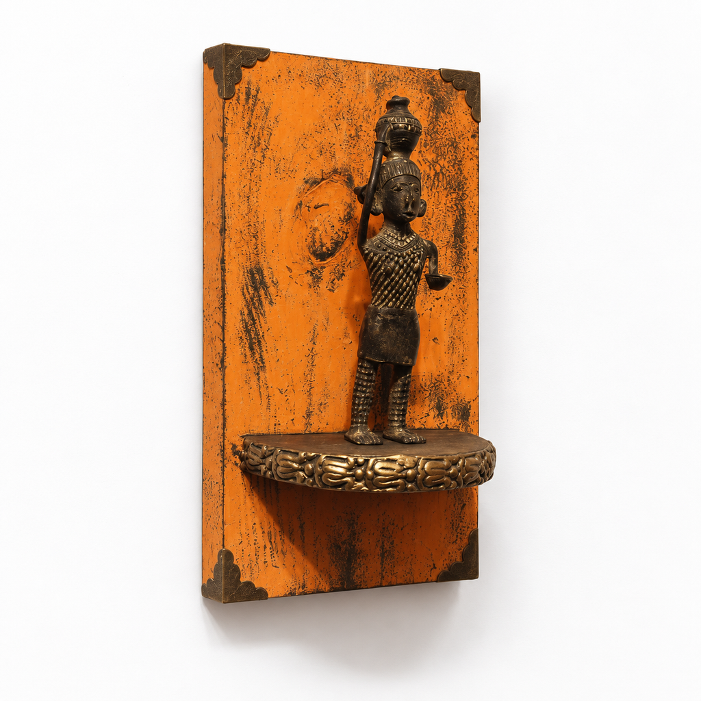 Orange wooden wall panel with brass figurine and small display ledge, hoWme.