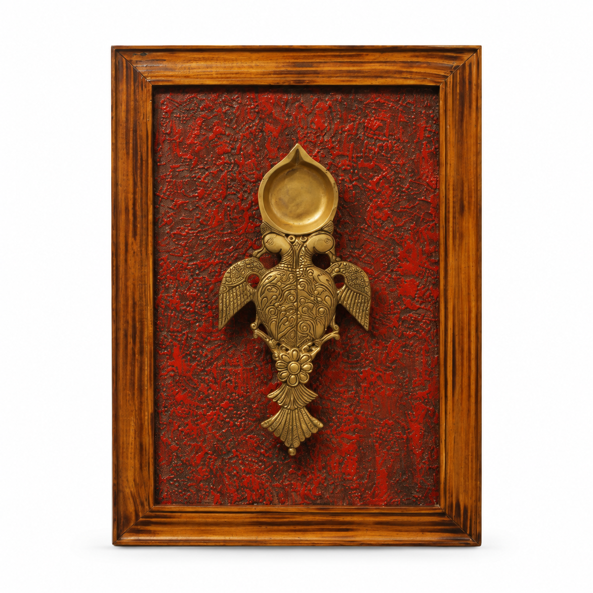 Handcrafted framed brass aarti diya on maroon backdrop – full view for wall décor – hoWme
