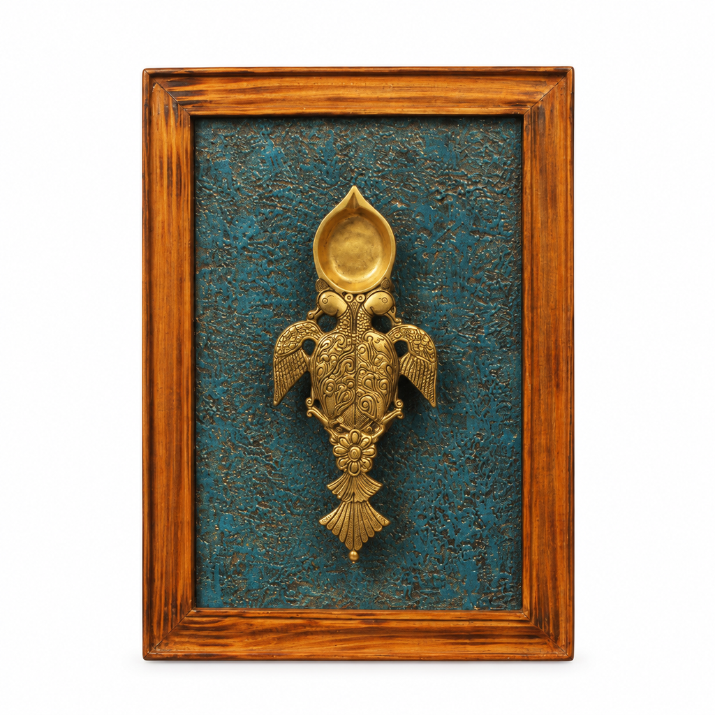 Handcrafted framed brass aarti diya on teal backdrop – full view for wall décor – hoWme
