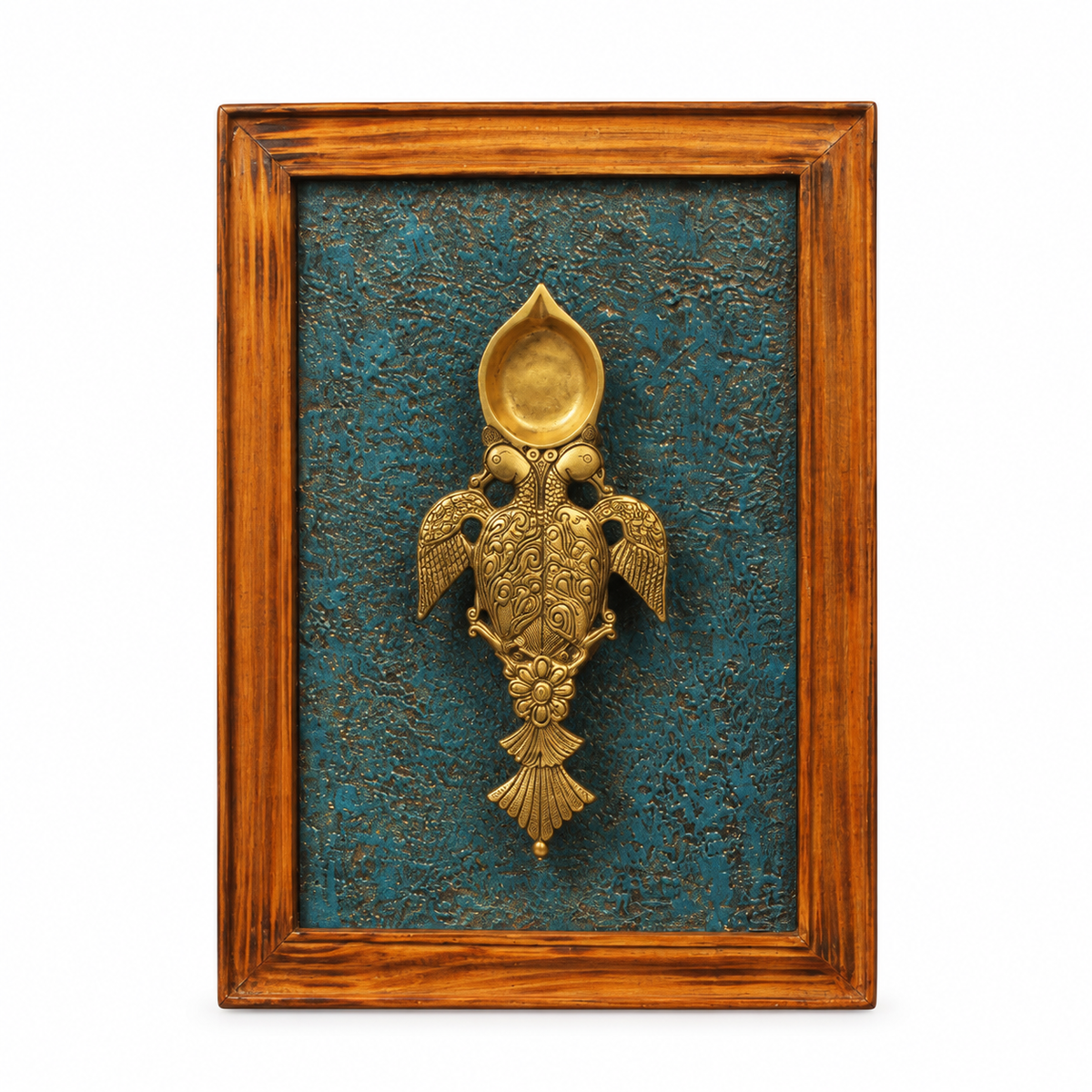 Handcrafted framed brass aarti diya on teal backdrop – full view for wall décor – hoWme