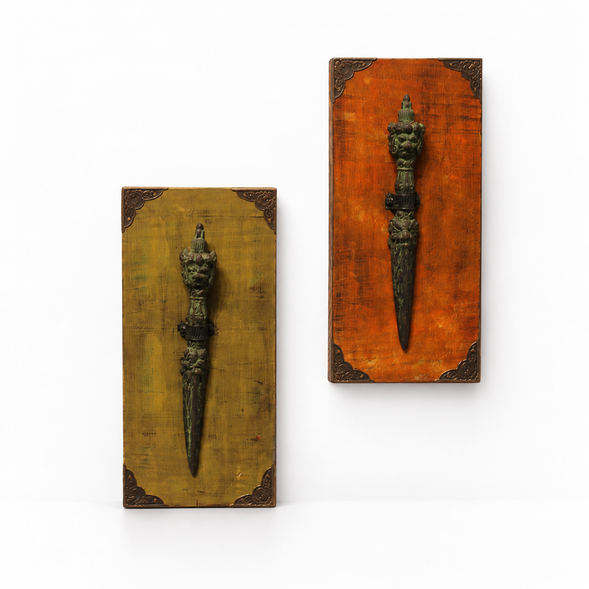 Pair of orange and green wooden wall panels with raised metal artefacts – hoWme