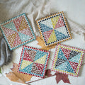 Multicolour mosaic MDF coasters set of four - hoWme