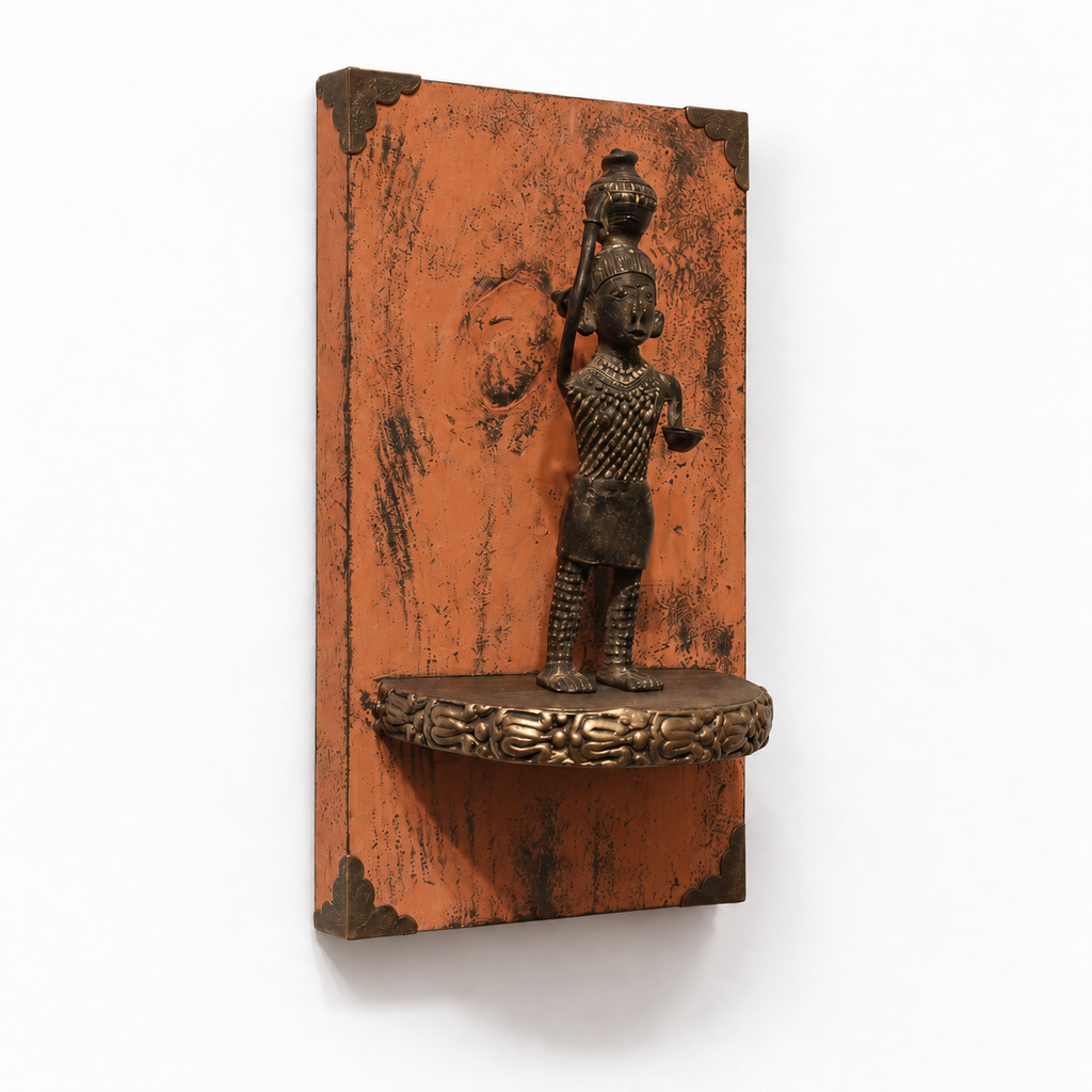 Angled view of orange wooden wall shelf with brass figurine – hoWme