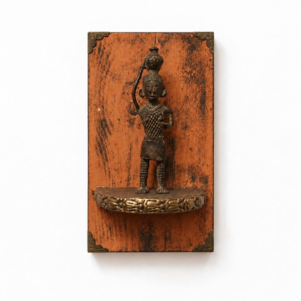 Orange wooden wall shelf with brass figurine, front view on white – hoWme