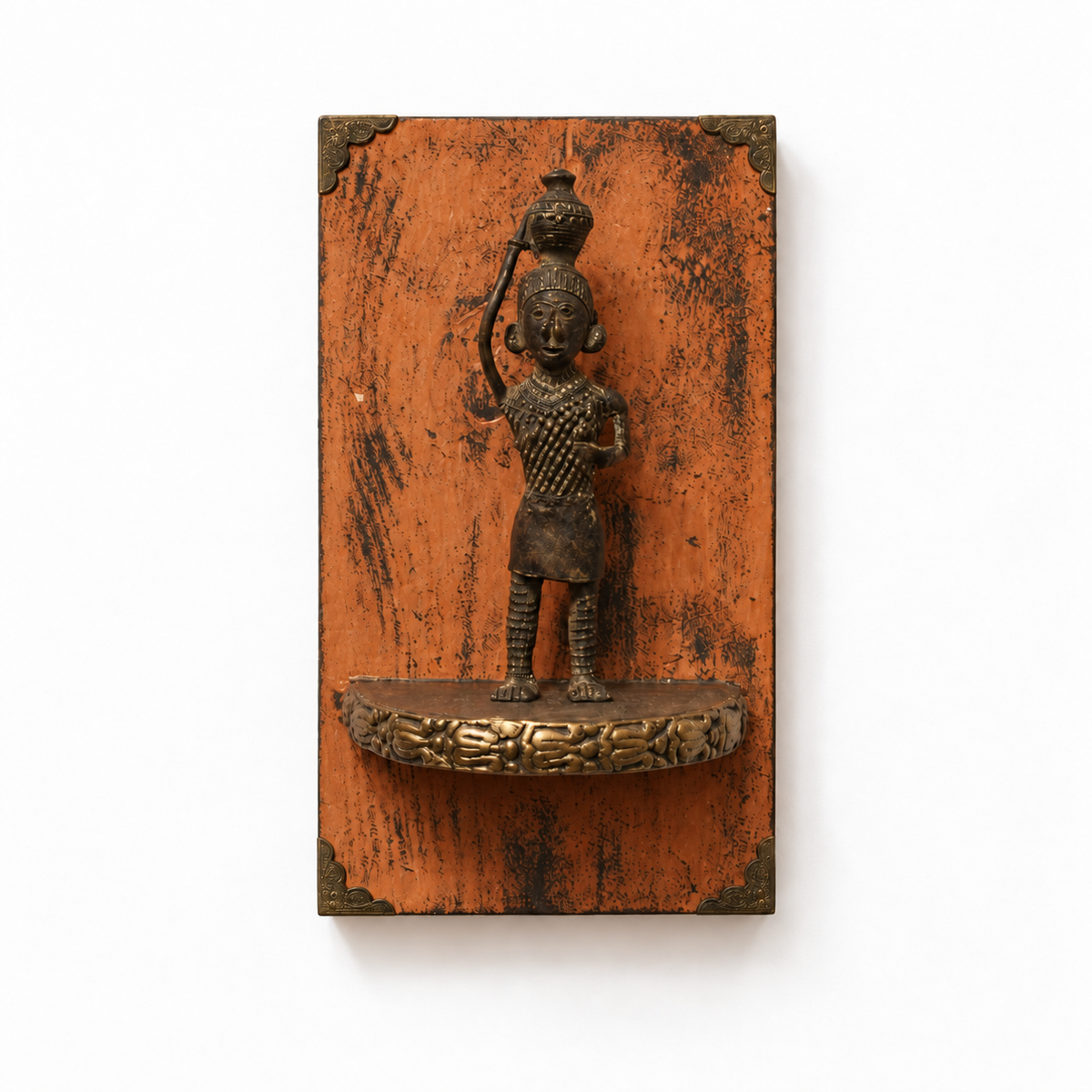 Orange wooden wall shelf with brass figurine, front view on white – hoWme