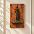 Orange wooden wall shelf with brass figurine displayed on a light wall – hoWme