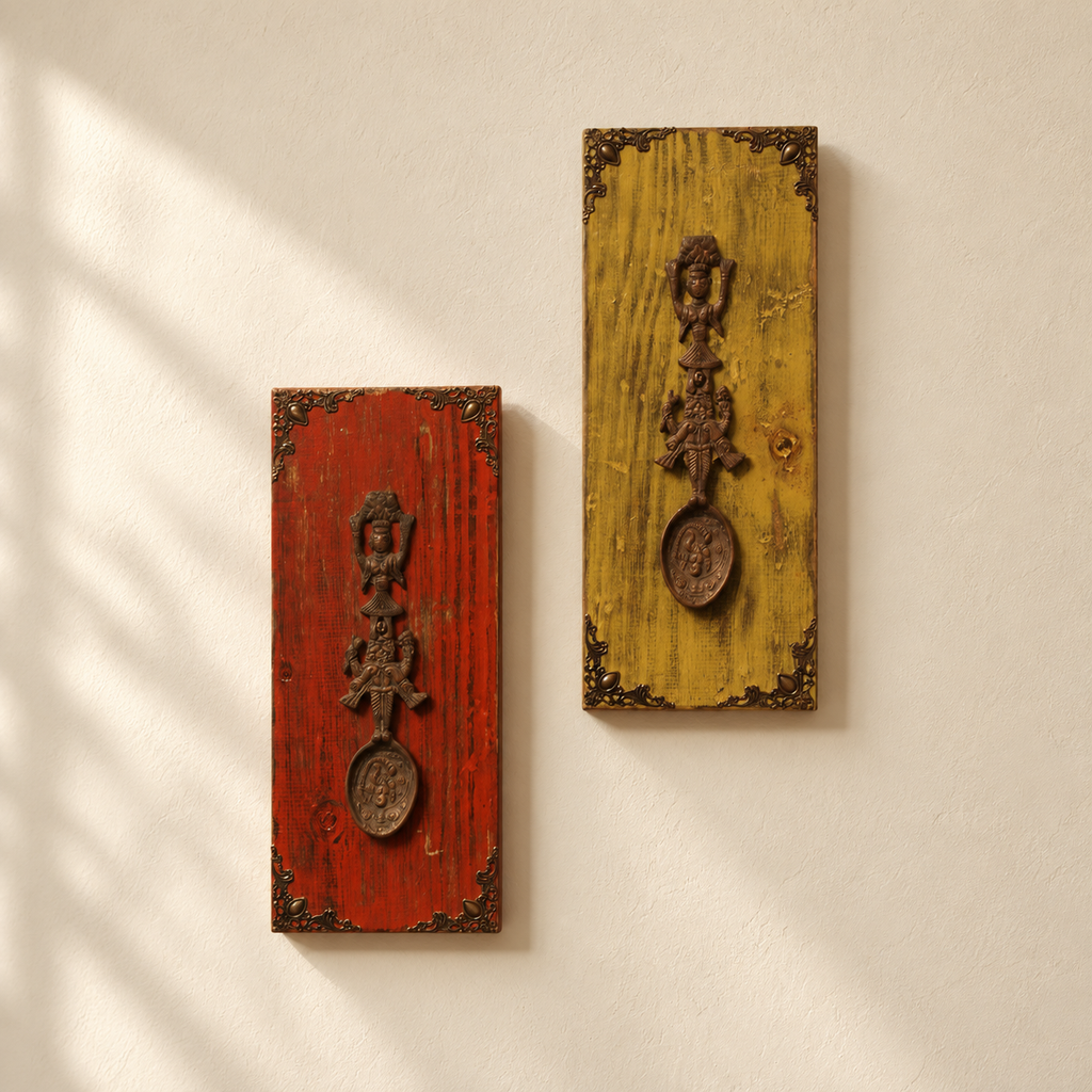 Red wooden wall panel with raised brass artefact, shown on a wall. hoWme