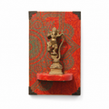 Hand-painted red wall art with a dancing brass Ganesha figure, hoWme.