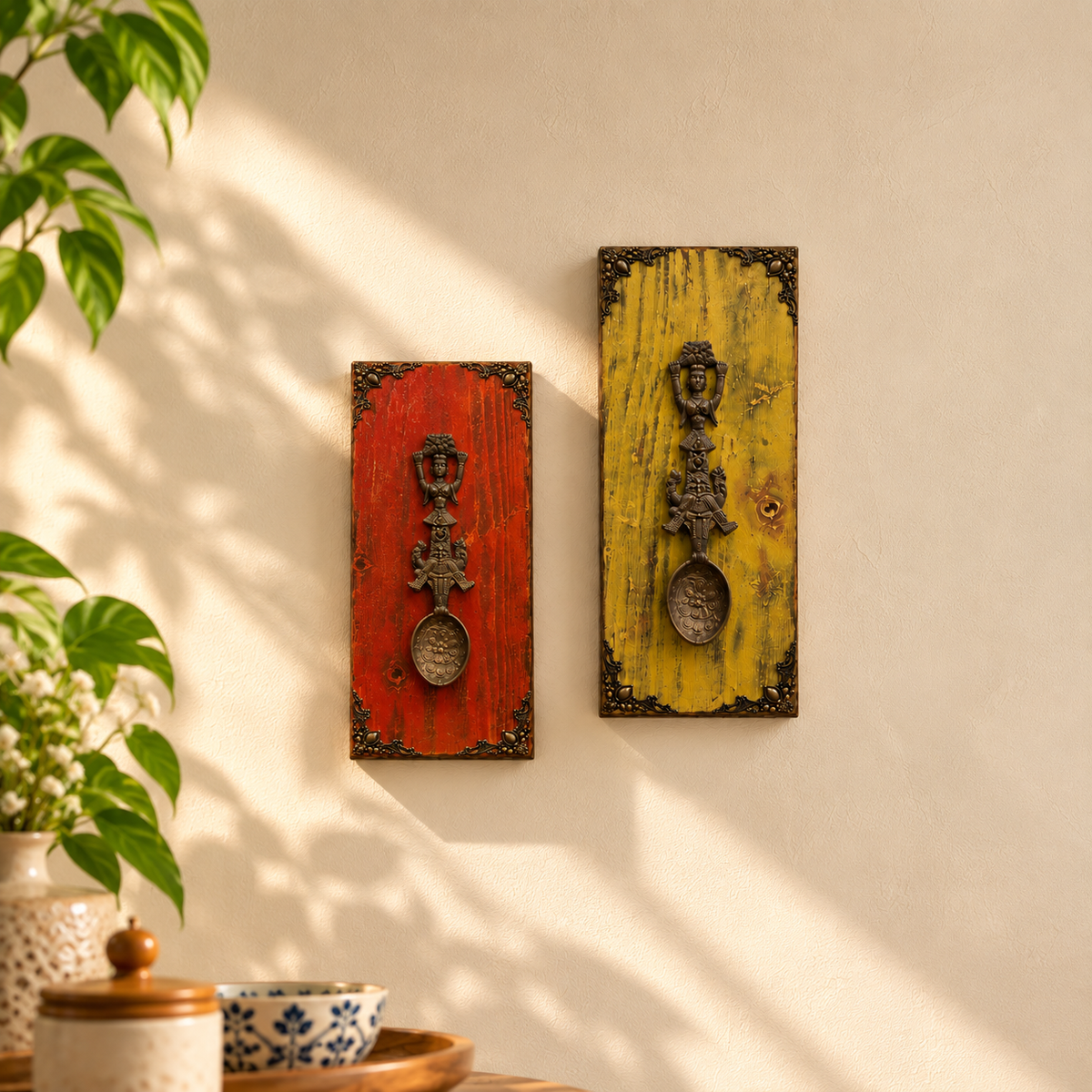 Red and yellow wooden wall panels with brass artefacts styled together. hoWme
