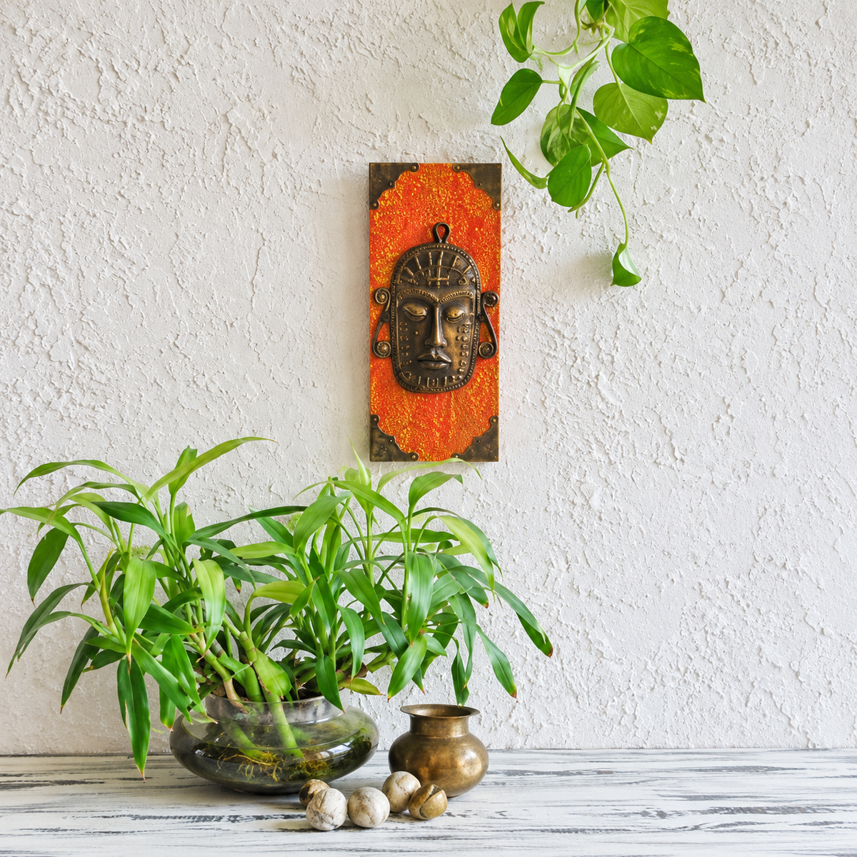 Handcrafted Tribal Face Brass Artefact on Wood styled on a wall – hoWme